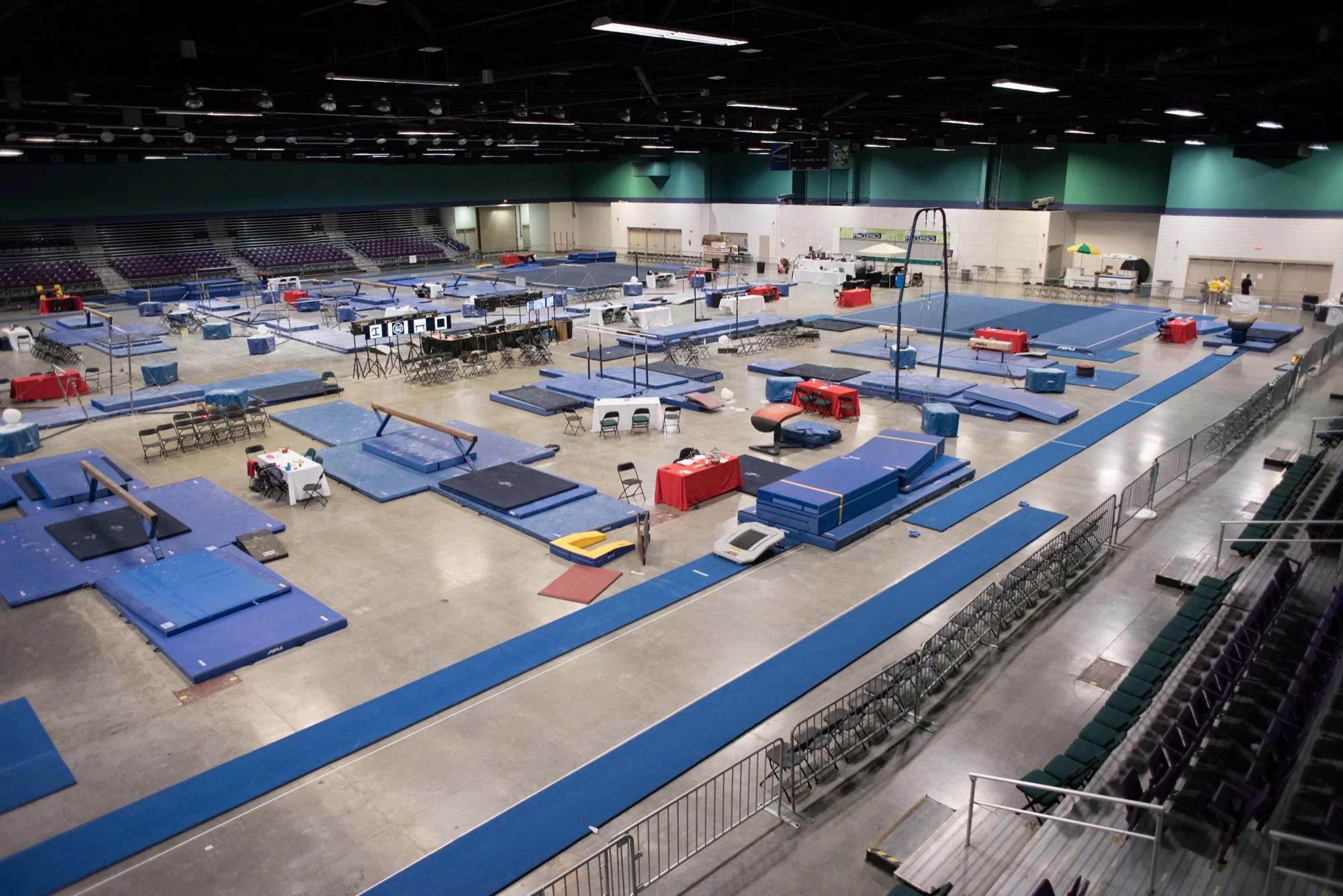 A competition gymnastics floor prepared inside the Greensboro Coliseum Complex