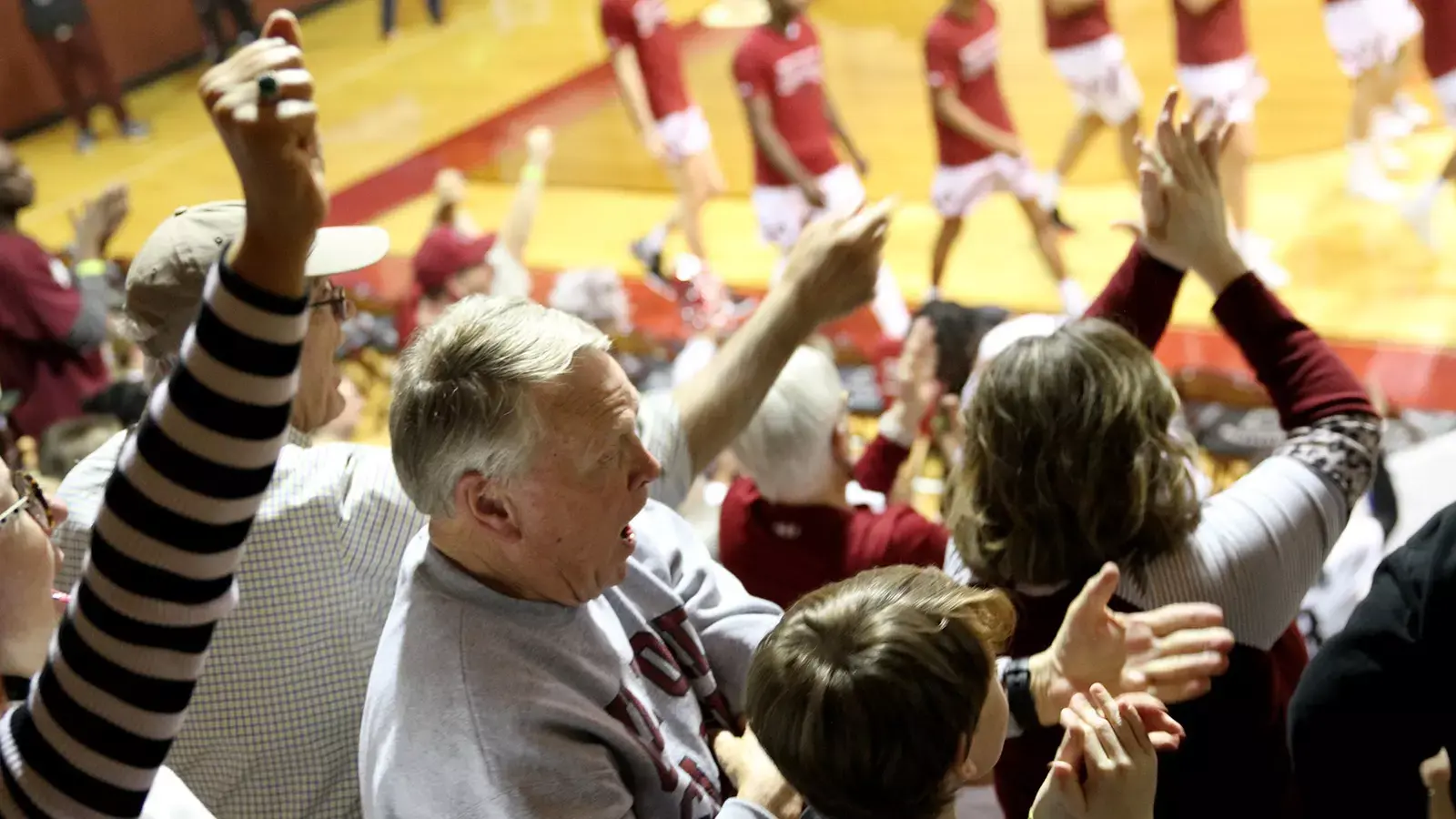 Guilford College basketball players and fans in Ragan-Brown Field House