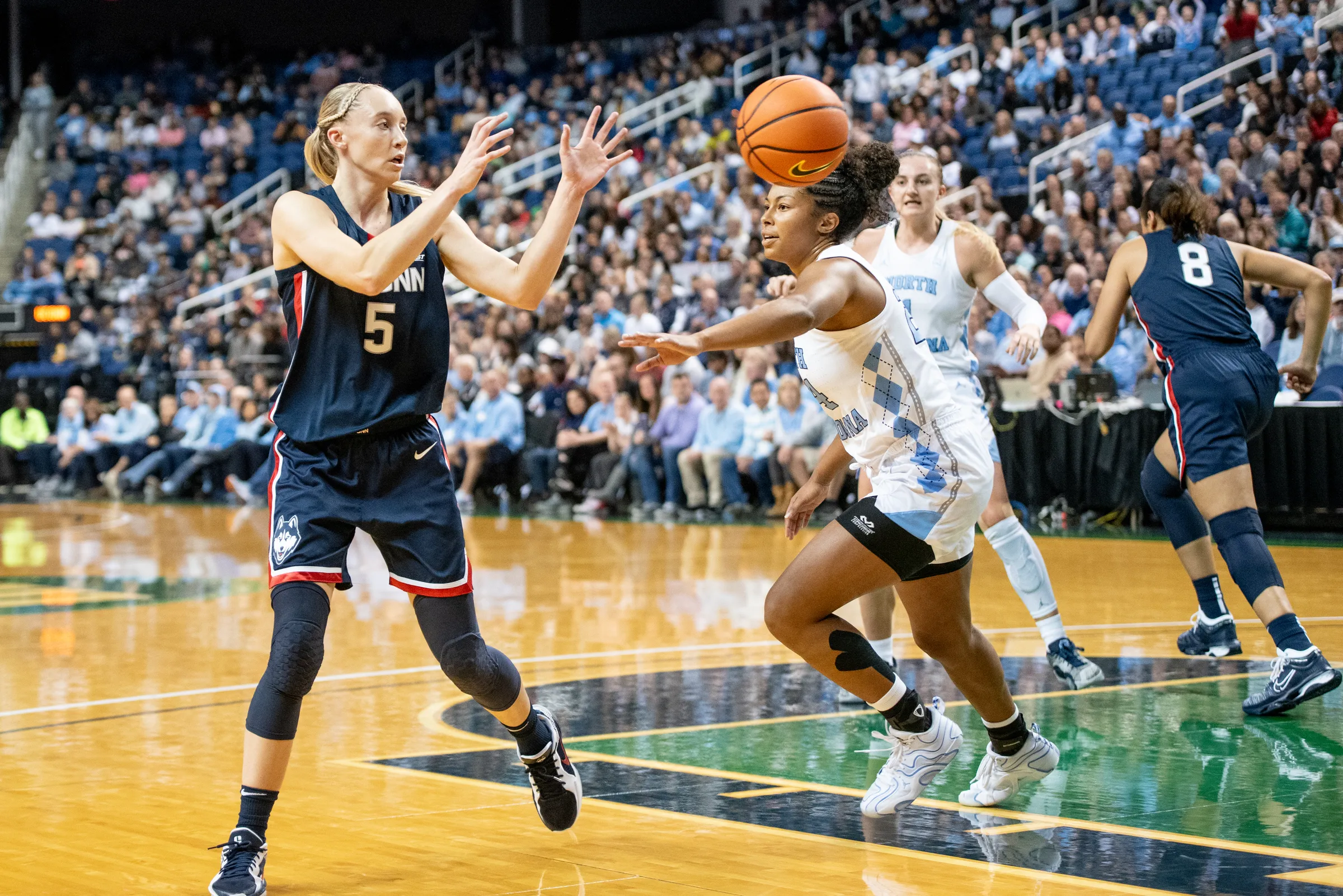 Paige Bueckers of UConn reaches for a pass against North Carolina in Greensboro