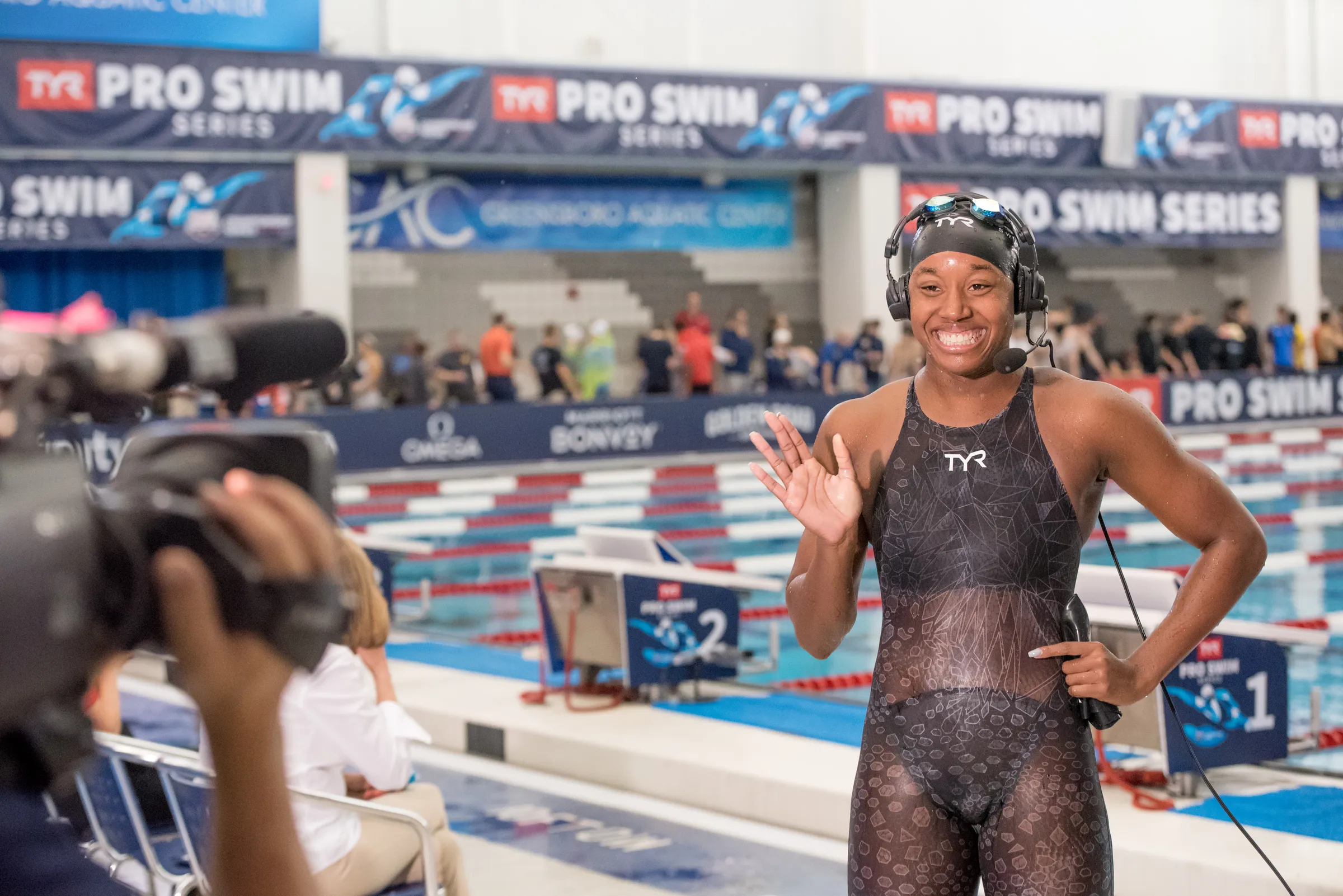Olympic champion Simone Manuel on the pool deck at the Greensboro Aquatic Center